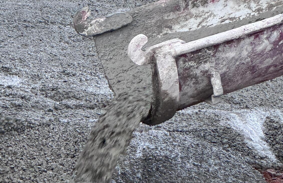 Concrete flowing from the truck chute