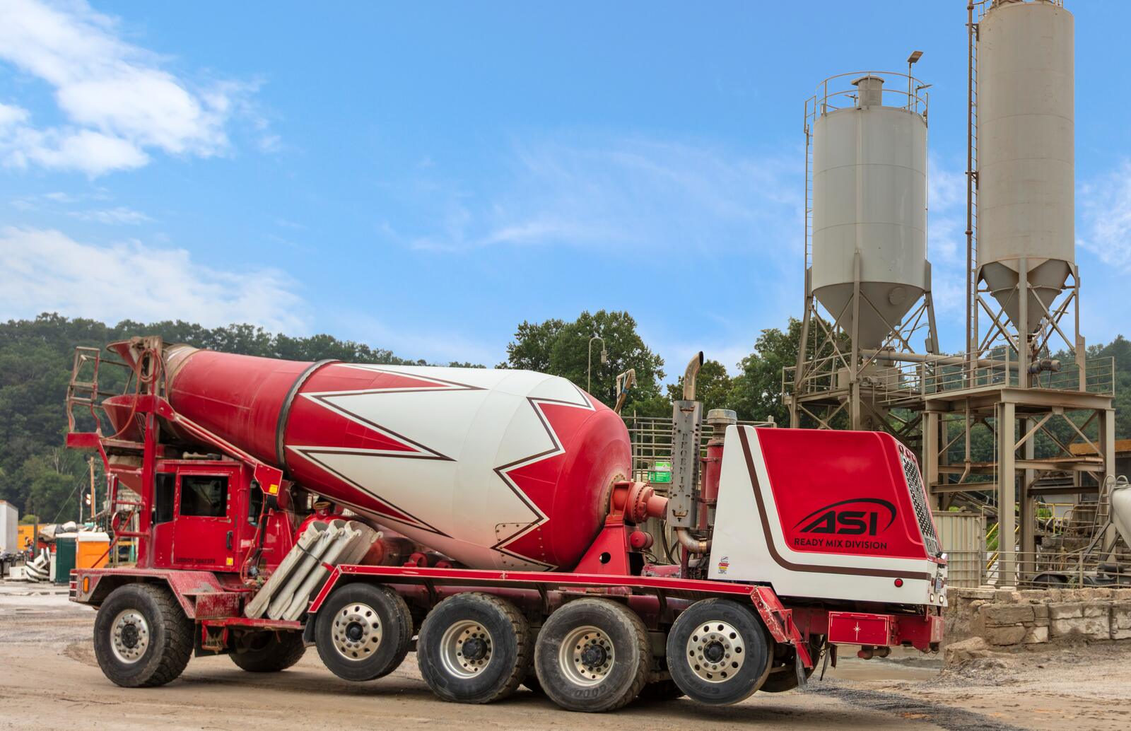 ASI mixer truck at the batch plant, silos behind